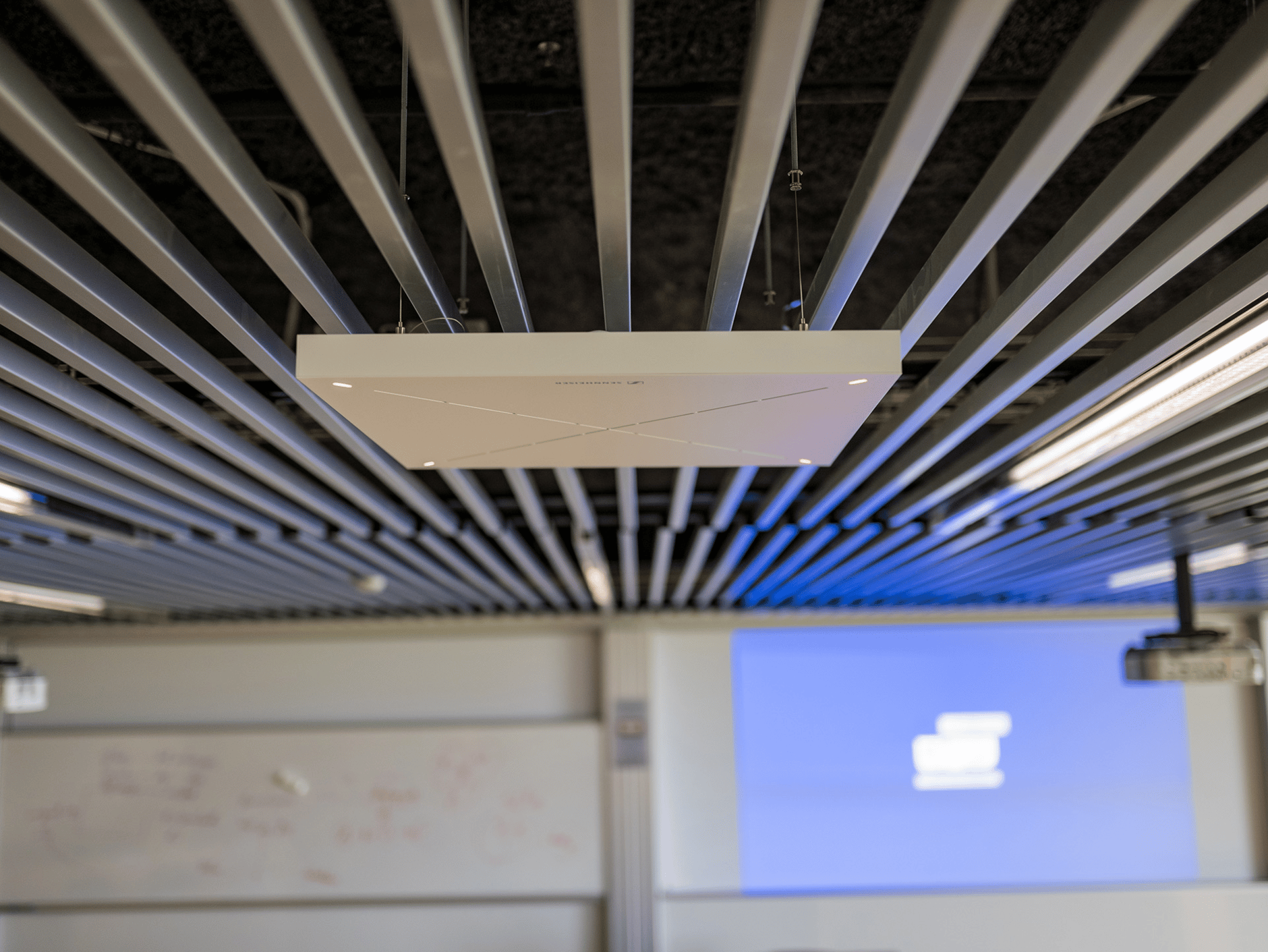 Sennheiser TCC2 ceiling microphone installed in a modern classroom at Reykjavik University.