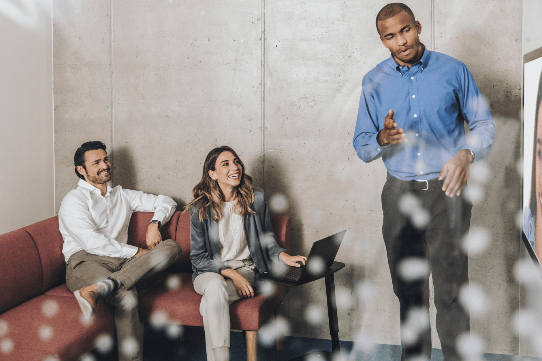 Group of professionals having a meeting in a modern office setting.