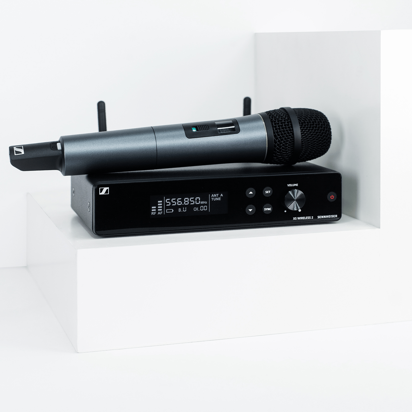 Sennheiser XS Wireless 2 microphone and receiver on white background