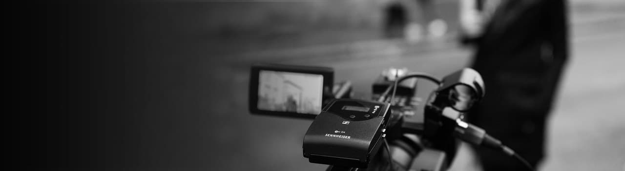Sennheiser wireless microphone system attached to a professional video camera.