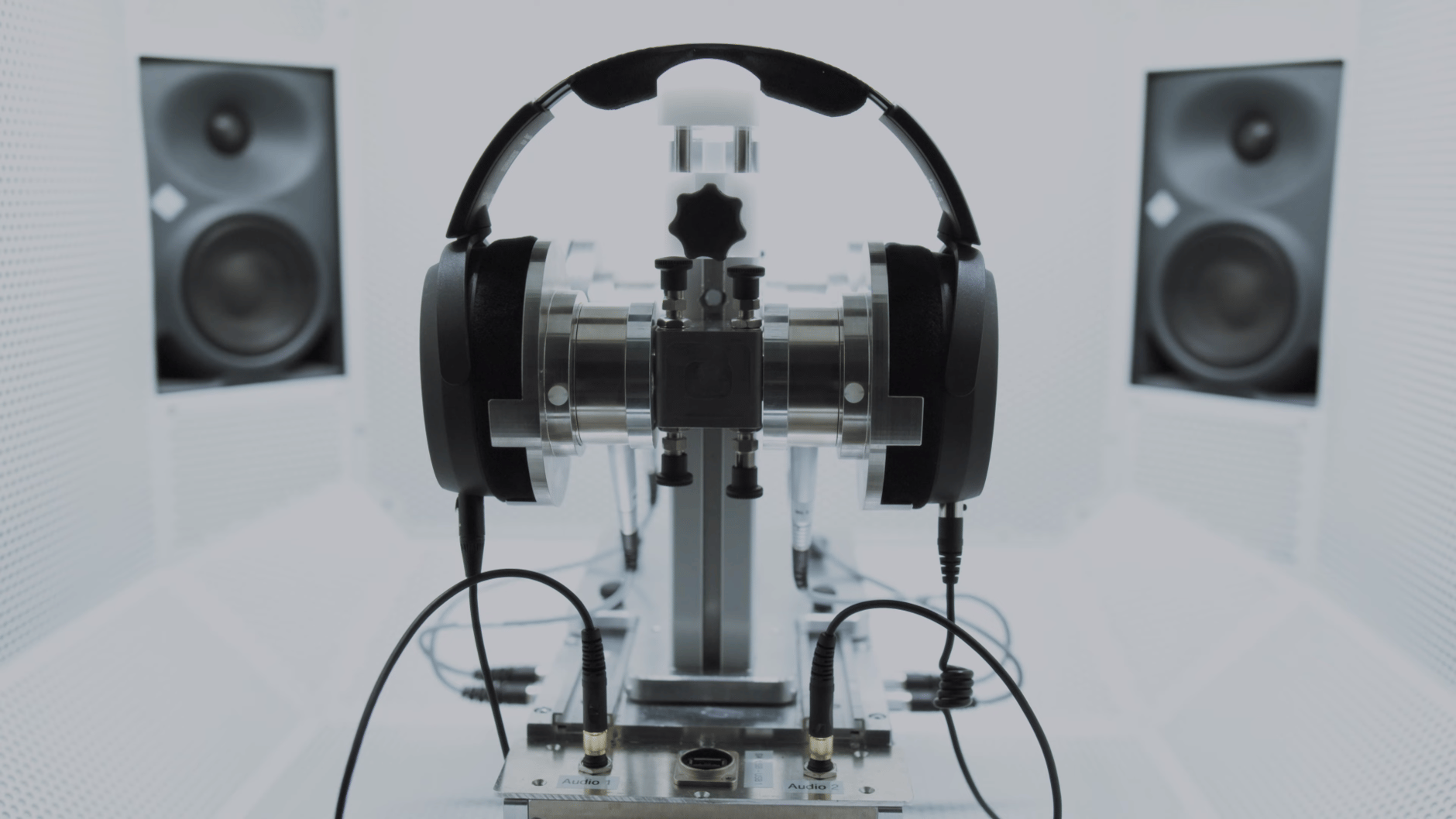 Sennheiser HD 490 PRO headphones in a white room with speakers