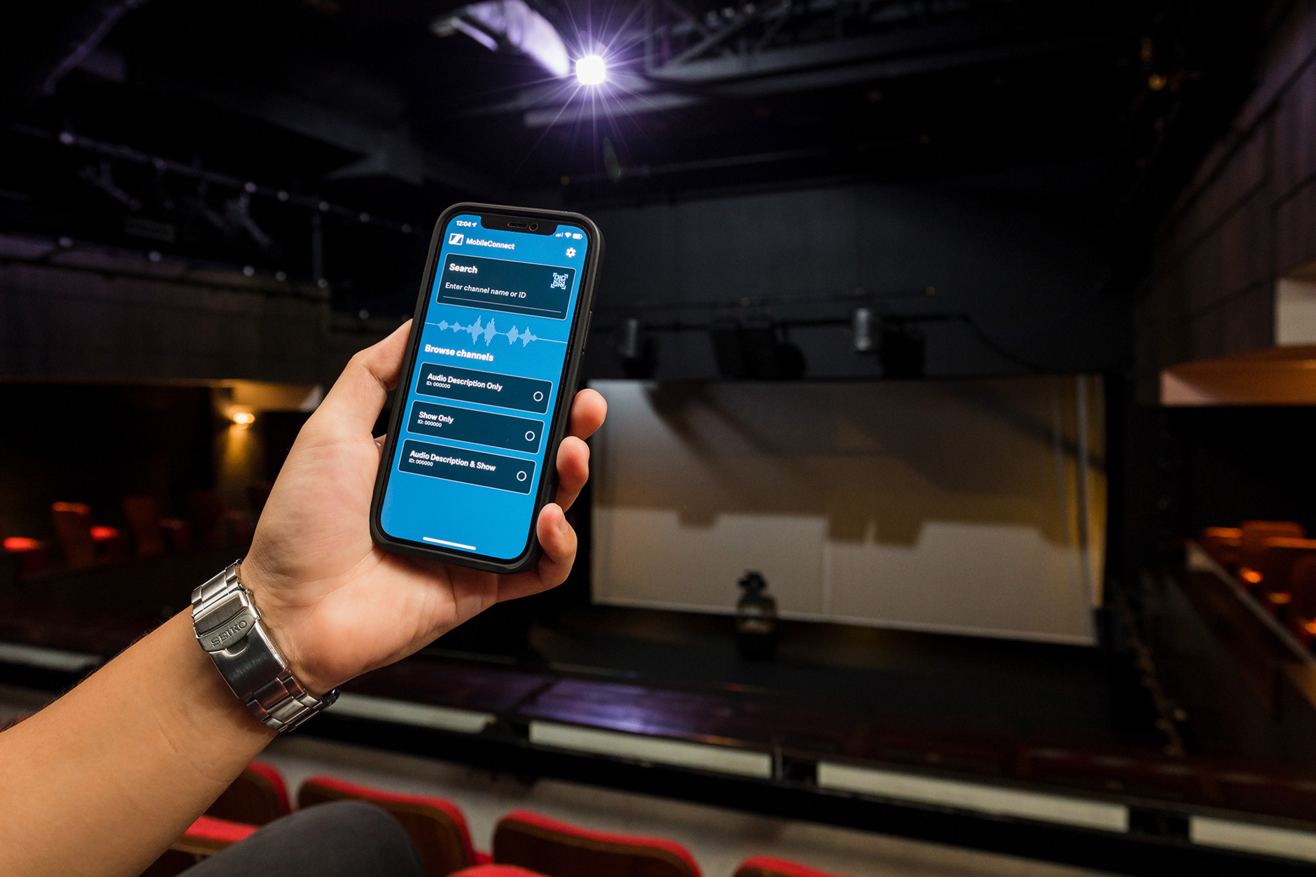 singapore-repertory-theatre-with-mobileconnect-app-on-phone-theatre-hall.jpg