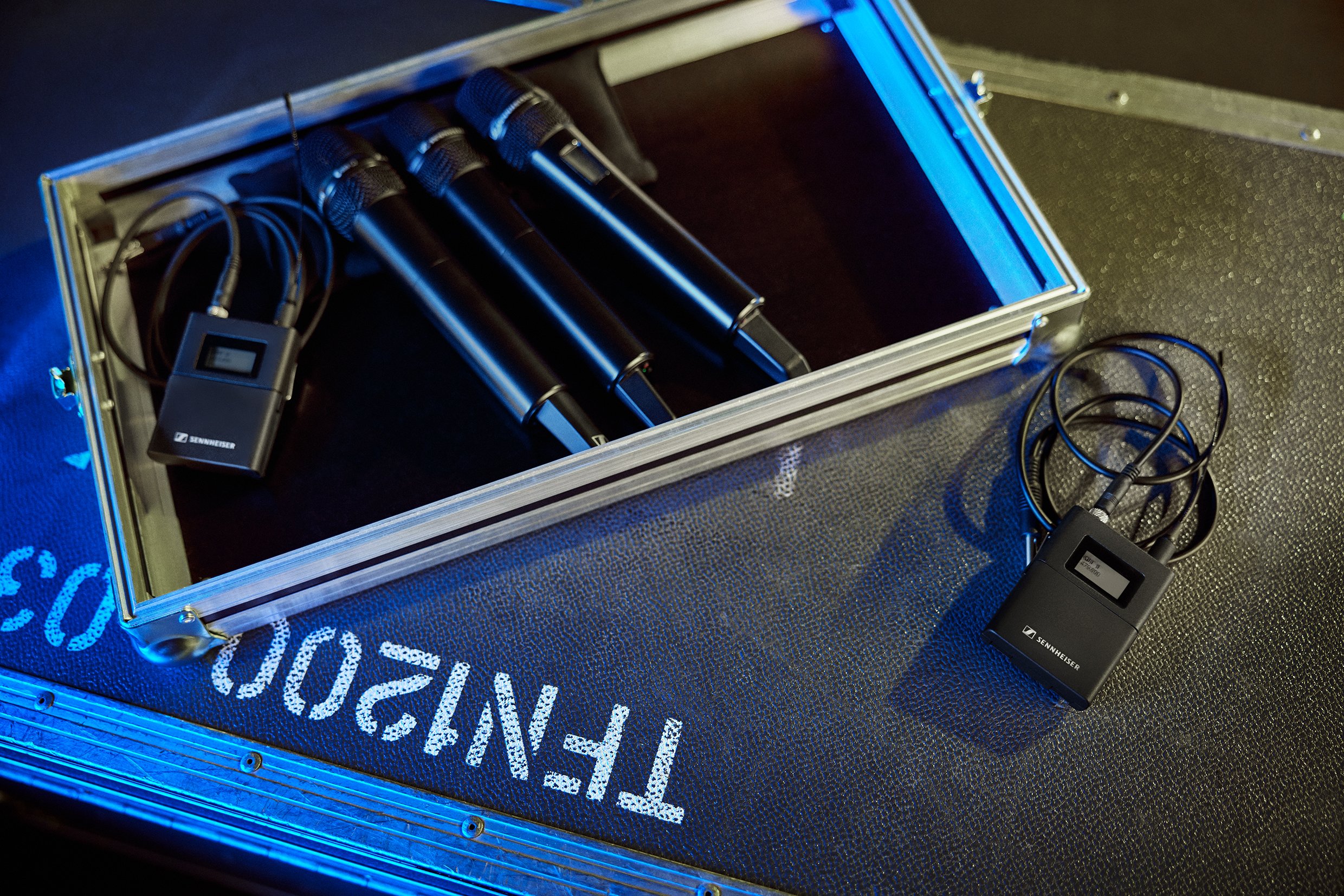 Sennheiser wireless microphone system with transmitters and receivers in a case.